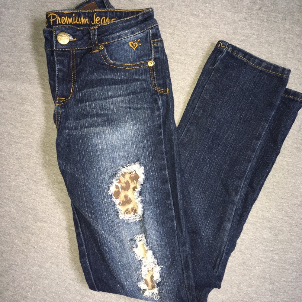 Size 12R justice girls jeans. Distressed cheetah